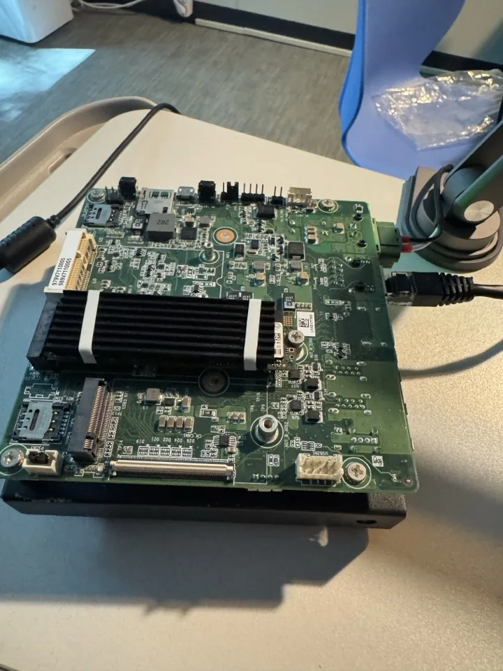 Jetson module with its heatsink on the carrier board, case opened on the bench