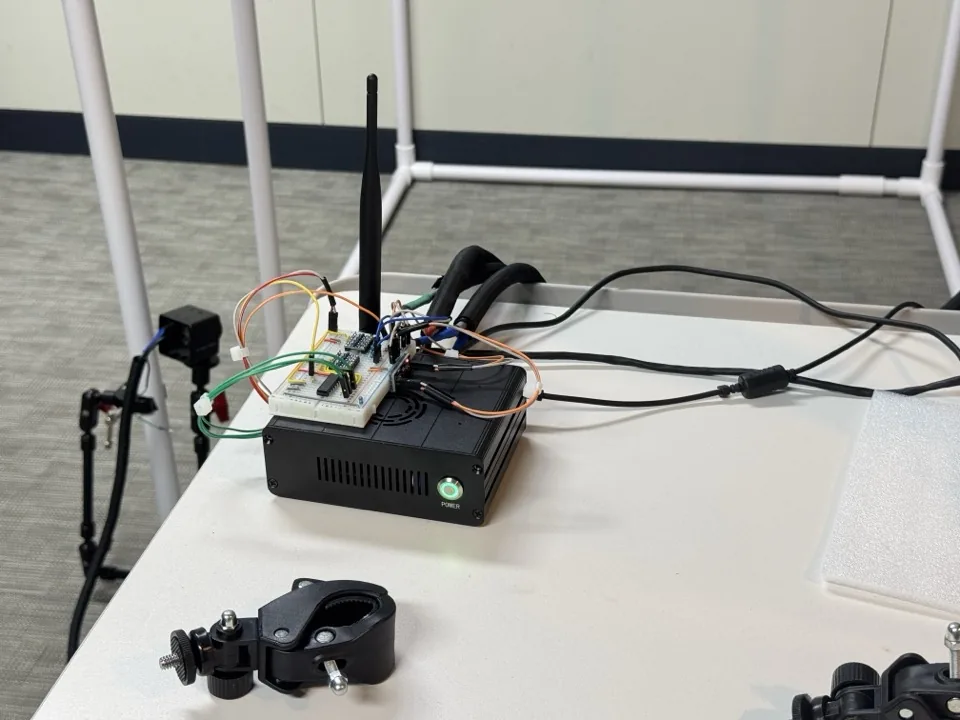 NVIDIA Jetson compute unit on the bench with the trigger board and camera modules wired to it